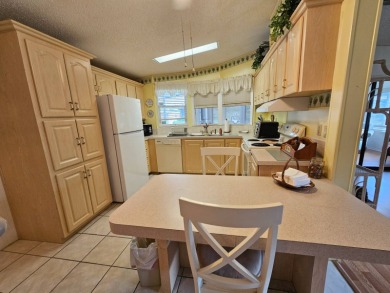 This home is located on leased land in a 55+ resort-style MH on Big Cypress Golf and Country Club in Florida - for sale on GolfHomes.com, golf home, golf lot