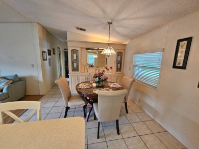 This home is located on leased land in a 55+ resort-style MH on Big Cypress Golf and Country Club in Florida - for sale on GolfHomes.com, golf home, golf lot