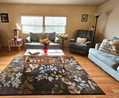 This home is located on leased land in a 55+ resort-style MH on Big Cypress Golf and Country Club in Florida - for sale on GolfHomes.com, golf home, golf lot