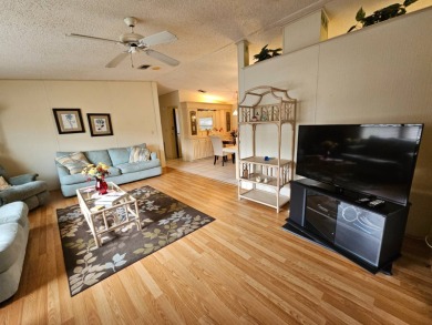 This home is located on leased land in a 55+ resort-style MH on Big Cypress Golf and Country Club in Florida - for sale on GolfHomes.com, golf home, golf lot