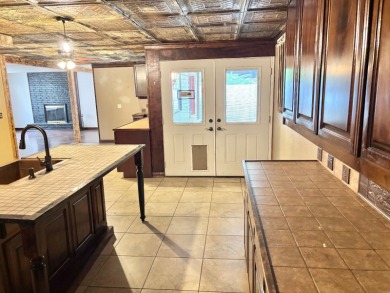This 3 bedroom, 2 bath home is move-in ready and perfectly on Idabel Country Club in Oklahoma - for sale on GolfHomes.com, golf home, golf lot