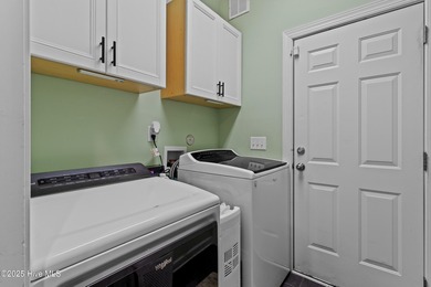 This lovely brick townhome is tucked away in one of Leland's on Magnolia Greens Golf Plantation in North Carolina - for sale on GolfHomes.com, golf home, golf lot