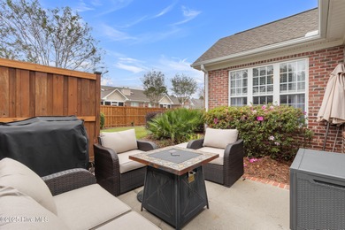 This lovely brick townhome is tucked away in one of Leland's on Magnolia Greens Golf Plantation in North Carolina - for sale on GolfHomes.com, golf home, golf lot
