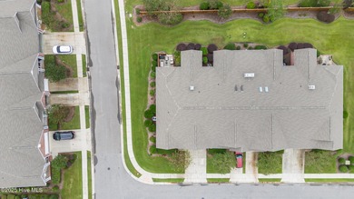 This lovely brick townhome is tucked away in one of Leland's on Magnolia Greens Golf Plantation in North Carolina - for sale on GolfHomes.com, golf home, golf lot