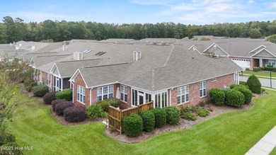 This lovely brick townhome is tucked away in one of Leland's on Magnolia Greens Golf Plantation in North Carolina - for sale on GolfHomes.com, golf home, golf lot