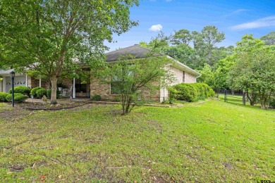 Welcome to your dream home in the heart of Holly Lake Ranch! on Holly Lake Ranch Golf Club in Texas - for sale on GolfHomes.com, golf home, golf lot