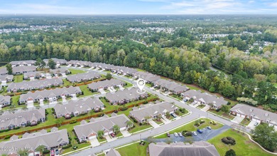 This lovely brick townhome is tucked away in one of Leland's on Magnolia Greens Golf Plantation in North Carolina - for sale on GolfHomes.com, golf home, golf lot