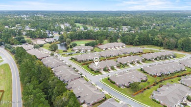 This lovely brick townhome is tucked away in one of Leland's on Magnolia Greens Golf Plantation in North Carolina - for sale on GolfHomes.com, golf home, golf lot