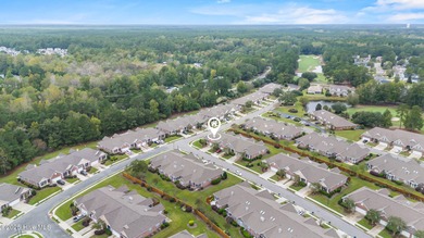 This lovely brick townhome is tucked away in one of Leland's on Magnolia Greens Golf Plantation in North Carolina - for sale on GolfHomes.com, golf home, golf lot