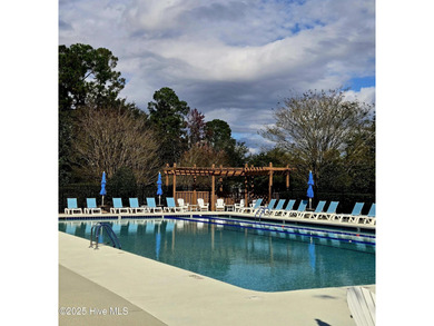 This lovely brick townhome is tucked away in one of Leland's on Magnolia Greens Golf Plantation in North Carolina - for sale on GolfHomes.com, golf home, golf lot