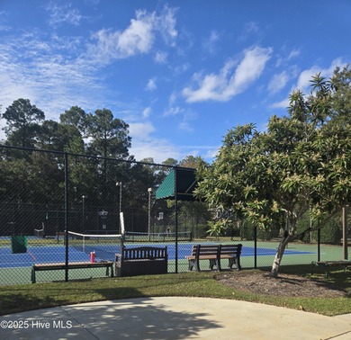 This lovely brick townhome is tucked away in one of Leland's on Magnolia Greens Golf Plantation in North Carolina - for sale on GolfHomes.com, golf home, golf lot