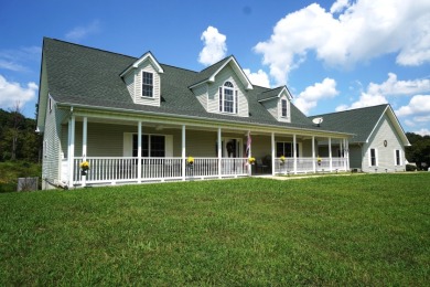 Nestled at the base of majestic English Mountain on Smoky Mountain Country Club in Tennessee - for sale on GolfHomes.com, golf home, golf lot