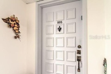 Escape the cold and embrace effortless Florida living in this on Isla Del Sol Yacht and Country Club in Florida - for sale on GolfHomes.com, golf home, golf lot