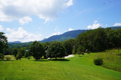 Nestled at the base of majestic English Mountain on Smoky Mountain Country Club in Tennessee - for sale on GolfHomes.com, golf home, golf lot
