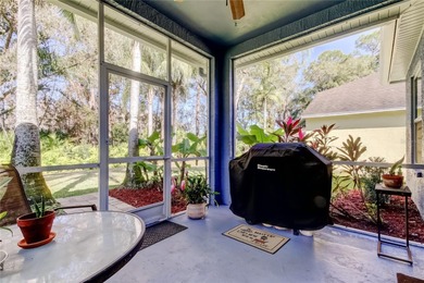 This fantastic Westchase home is located on a private wooded on Westchase Golf Club in Florida - for sale on GolfHomes.com, golf home, golf lot