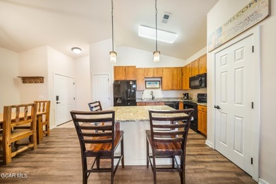 Wake up to panoramic mountain views, spend your days skiing or on Headwaters Golf Course At Granby Ranch in Colorado - for sale on GolfHomes.com, golf home, golf lot