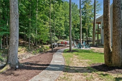 Charming Lakeside Retreat Just Steps from the Water! Welcome to on The Highlands Course at Lake Arrowhead in Georgia - for sale on GolfHomes.com, golf home, golf lot