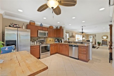 Experience Florida living at its finest with this beautifully on Panther Run Golf Club in Florida - for sale on GolfHomes.com, golf home, golf lot