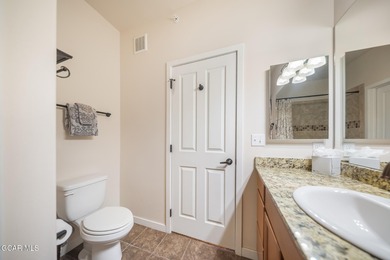 Wake up to panoramic mountain views, spend your days skiing or on Headwaters Golf Course At Granby Ranch in Colorado - for sale on GolfHomes.com, golf home, golf lot