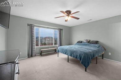 Discover this bright two-story home in the Woodmen Hills on Antler Creek Golf Course in Colorado - for sale on GolfHomes.com, golf home, golf lot