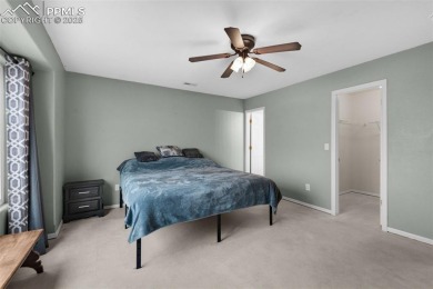 Discover this bright two-story home in the Woodmen Hills on Antler Creek Golf Course in Colorado - for sale on GolfHomes.com, golf home, golf lot