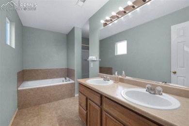Discover this bright two-story home in the Woodmen Hills on Antler Creek Golf Course in Colorado - for sale on GolfHomes.com, golf home, golf lot