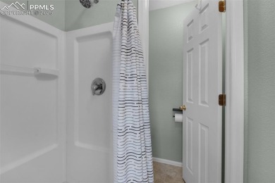 Discover this bright two-story home in the Woodmen Hills on Antler Creek Golf Course in Colorado - for sale on GolfHomes.com, golf home, golf lot
