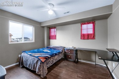 Discover this bright two-story home in the Woodmen Hills on Antler Creek Golf Course in Colorado - for sale on GolfHomes.com, golf home, golf lot