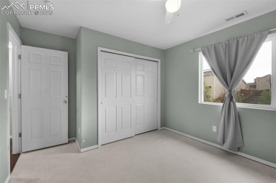 Discover this bright two-story home in the Woodmen Hills on Antler Creek Golf Course in Colorado - for sale on GolfHomes.com, golf home, golf lot