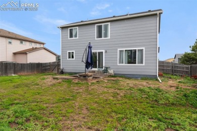 Discover this bright two-story home in the Woodmen Hills on Antler Creek Golf Course in Colorado - for sale on GolfHomes.com, golf home, golf lot