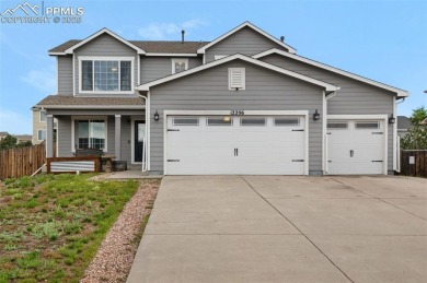 Discover this bright two-story home in the Woodmen Hills on Antler Creek Golf Course in Colorado - for sale on GolfHomes.com, golf home, golf lot