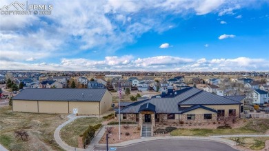 Discover this bright two-story home in the Woodmen Hills on Antler Creek Golf Course in Colorado - for sale on GolfHomes.com, golf home, golf lot