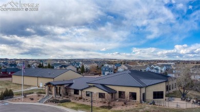 Discover this bright two-story home in the Woodmen Hills on Antler Creek Golf Course in Colorado - for sale on GolfHomes.com, golf home, golf lot