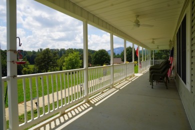 Nestled at the base of majestic English Mountain on Smoky Mountain Country Club in Tennessee - for sale on GolfHomes.com, golf home, golf lot