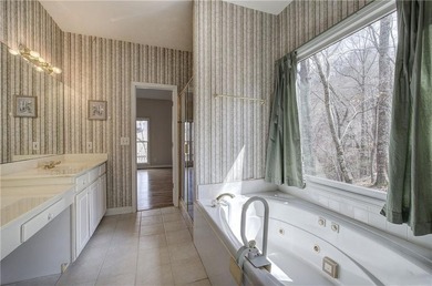 Nestled in a private area of Bent Tree and conveniently located on Bent Tree Golf Course in Georgia - for sale on GolfHomes.com, golf home, golf lot