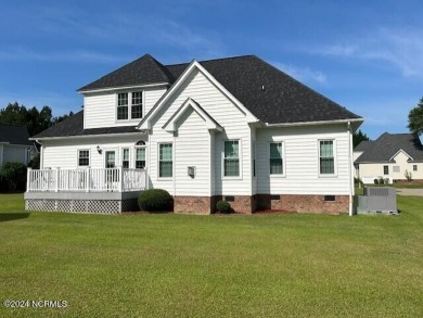 Welcome home! This four bedroom home features first floor on The Golf Club At Rocky Mount in North Carolina - for sale on GolfHomes.com, golf home, golf lot