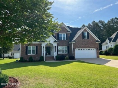 Welcome home! This four bedroom home features first floor on The Golf Club At Rocky Mount in North Carolina - for sale on GolfHomes.com, golf home, golf lot