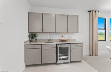 Fall in love with the stunning Layton Grande home in Terreno by on Valencia Golf and Country Club in Florida - for sale on GolfHomes.com, golf home, golf lot