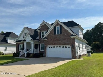 Welcome home! This four bedroom home features first floor on The Golf Club At Rocky Mount in North Carolina - for sale on GolfHomes.com, golf home, golf lot