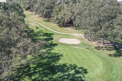 Tucked away on a peaceful cul-de-sac in the beautiful gated on Pine Mountain Lake Country Club in California - for sale on GolfHomes.com, golf home, golf lot