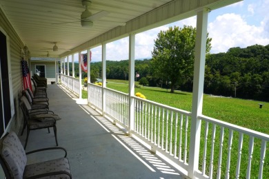 Nestled at the base of majestic English Mountain on Smoky Mountain Country Club in Tennessee - for sale on GolfHomes.com, golf home, golf lot