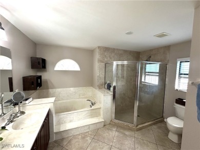 Custom built FIVE bedroom THREE bath pool home connected to on Copperhead Golf Club in Florida - for sale on GolfHomes.com, golf home, golf lot