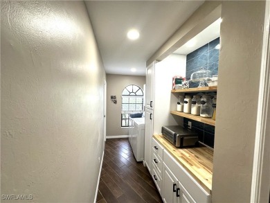Custom built FIVE bedroom THREE bath pool home connected to on Copperhead Golf Club in Florida - for sale on GolfHomes.com, golf home, golf lot