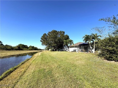 Custom built FIVE bedroom THREE bath pool home connected to on Copperhead Golf Club in Florida - for sale on GolfHomes.com, golf home, golf lot