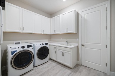 Discover an unparalleled lifestyle with this exceptional home on Esplanade Golf and Country at Lakewood Ranch in Florida - for sale on GolfHomes.com, golf home, golf lot