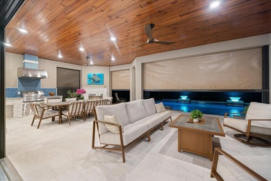 Discover an unparalleled lifestyle with this exceptional home on Esplanade Golf and Country at Lakewood Ranch in Florida - for sale on GolfHomes.com, golf home, golf lot