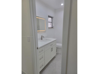 Beautifully updated single family home in Boynton Beach's on Leisureville Community Golf Course in Florida - for sale on GolfHomes.com, golf home, golf lot