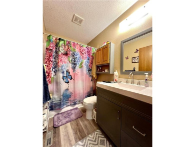 This comfortable two-bedroom townhome in Ortonville has been on Ortonville Muni Golf Course in Minnesota - for sale on GolfHomes.com, golf home, golf lot