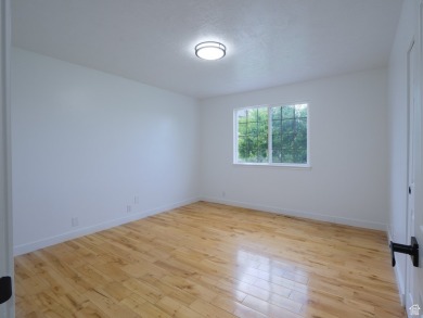 Spacious 6-Bedroom Home Near Stansbury Park Golf Course & Lake! on Stansbury Park Golf Club in Utah - for sale on GolfHomes.com, golf home, golf lot