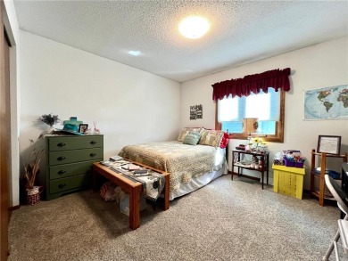 This comfortable two-bedroom townhome in Ortonville has been on Ortonville Muni Golf Course in Minnesota - for sale on GolfHomes.com, golf home, golf lot